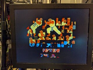 リュウによって描かれるタイトルロゴ